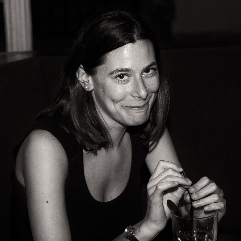 a woman smiling at the camera