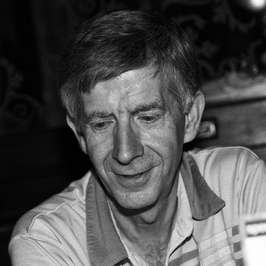 a man looking down at something