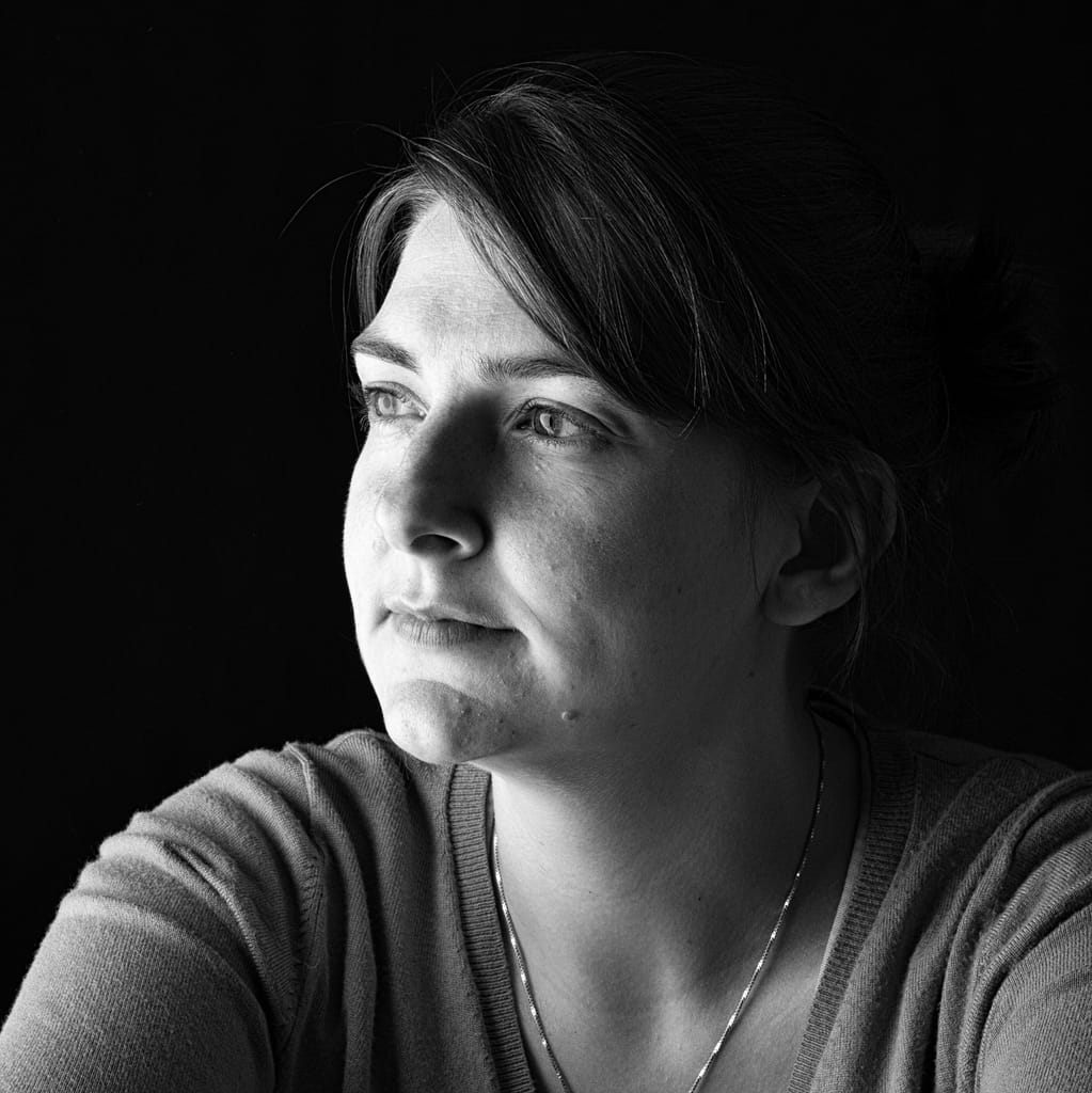 a woman looking away from the camera