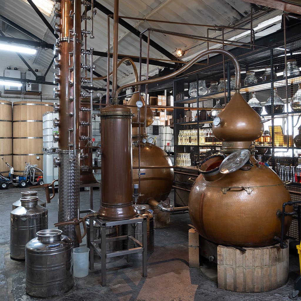 a large copper tanks in a distilary