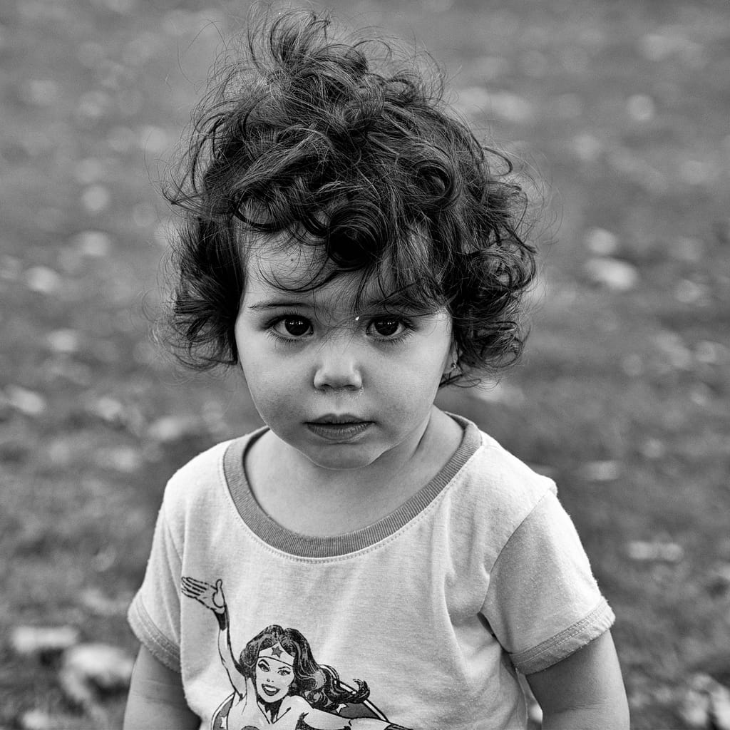 a child with curly hair