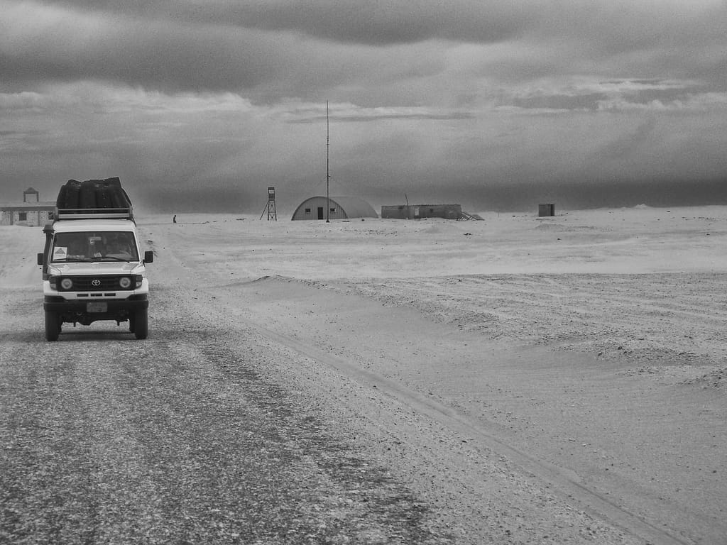 Egypt Eclipse Tour - a Landcruiser at a border Crossing in Black and white