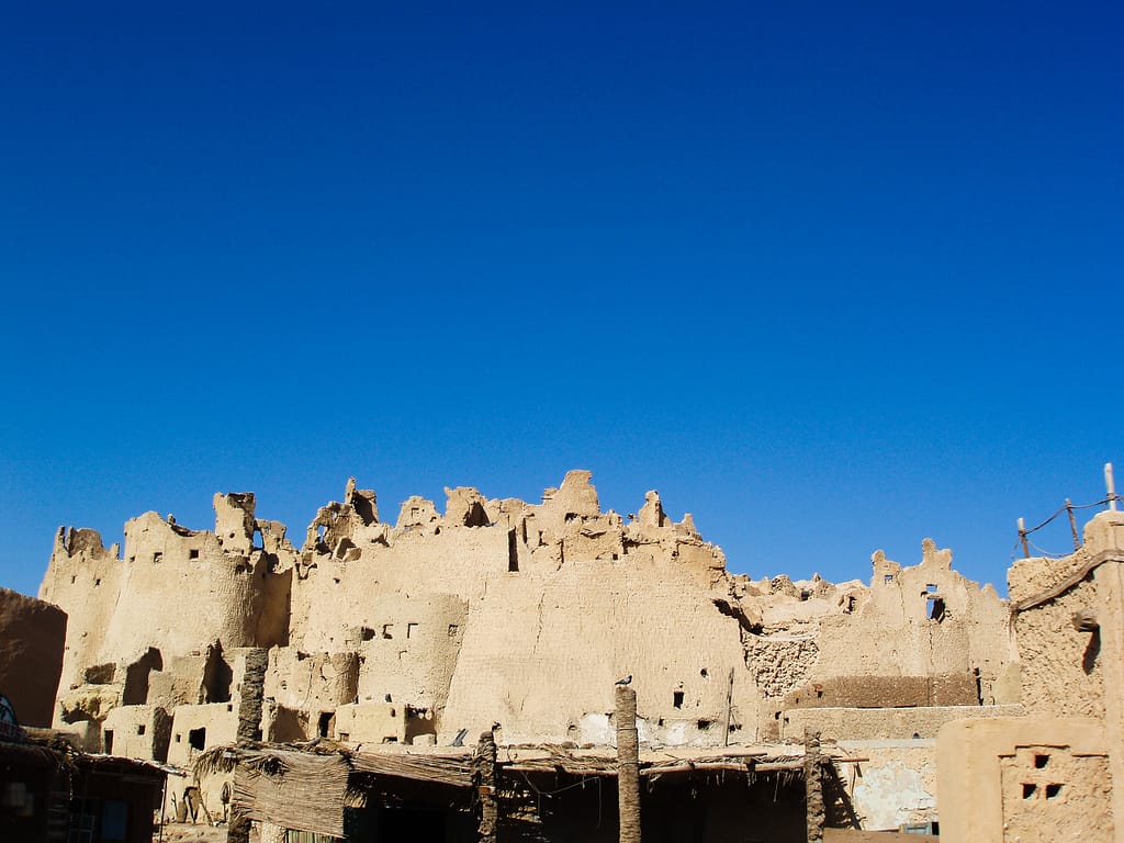 a stone building with blue sky